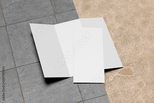 Realistic Tri-Fold Brochure Mockup on Outdoor Tile Floor Background