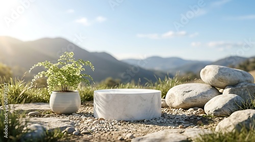 Empty marble podium for product display in a natural outdoor setting with mountains and sunlight