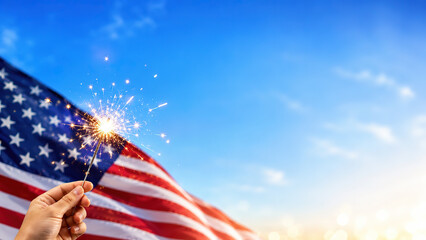 Sparkler Burning in Front of American Flag on Bright Blue Background, Fourth of July Celebration