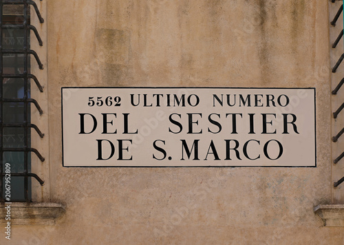 Fotografie Venetian street sign on wall indicating the last address number of San Marco ses