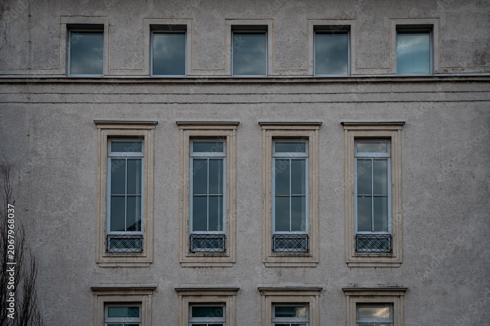 Obraz premium Upper façade detail – Invalidenstraße, Berlin‑Mitte, Germany