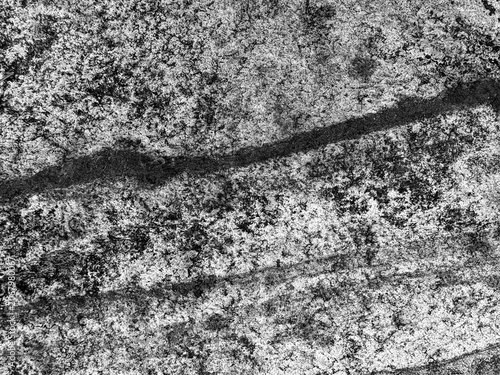 Valokuva High contrast black and white macro of natural stone texture