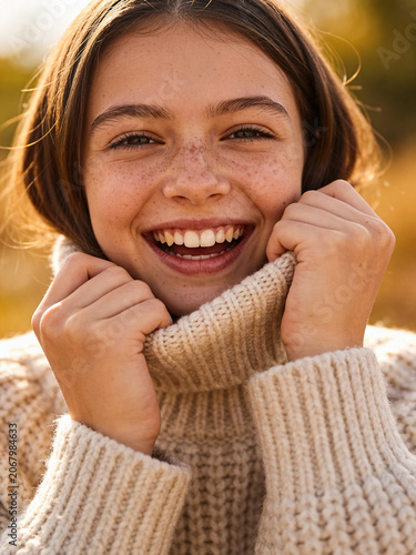 Summer sunny portrait of a young person in natural light, warm outdoor atmosphere with a bright seasonal mood and relaxed lifestyle feeling