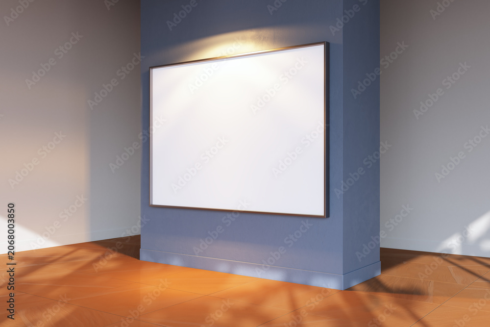 Fototapeta premium Large blank framed canvas displayed on blue wall inside modern gallery room with soft light creating calm contemporary interior atmosphere. 3D Rendering