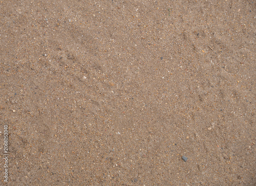 Flat lay brown sand and fine gravel texture, natural earth background