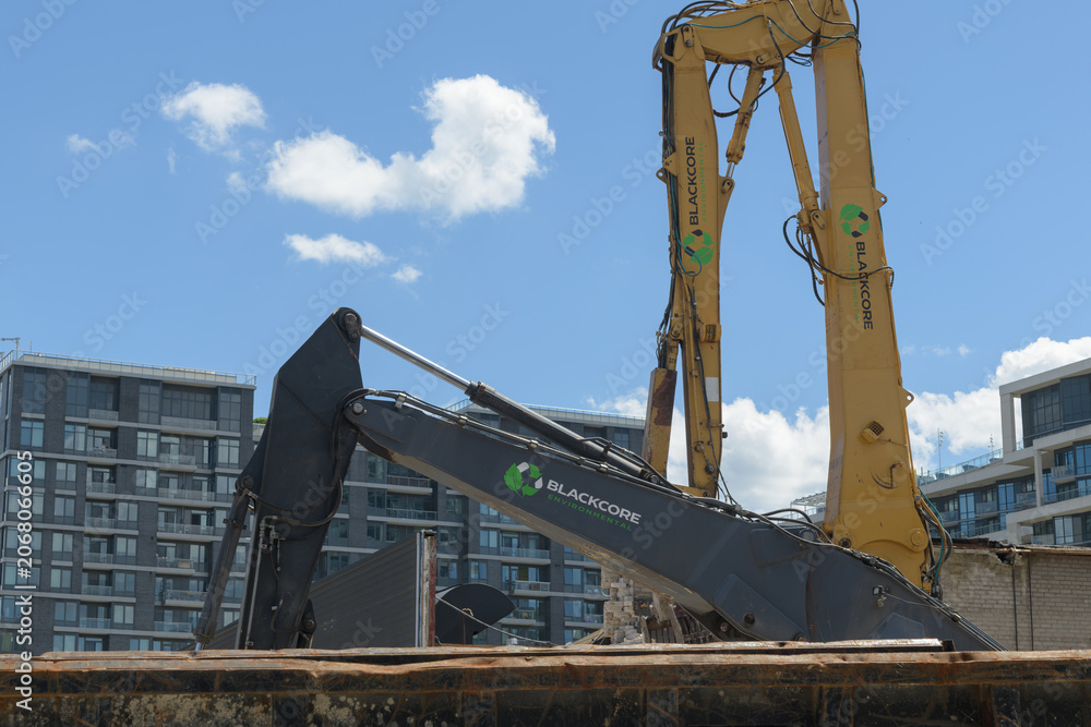 Fototapeta premium construction site with Blackcore Construction Inc machinery at about 259 Lake Shore Blvd E, Toronto