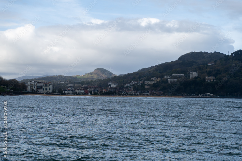 Fototapeta premium Panoramic view of San Sebastián coastline with Miramar Palace and Bay of Biscay, Basque Country, Spain