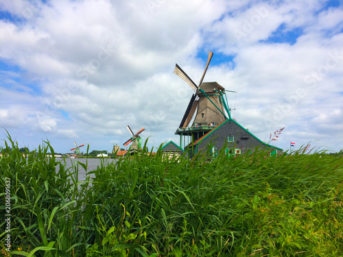 Panoramic view of windmills in Zaanse Schans, traditional village in the Netherlands.