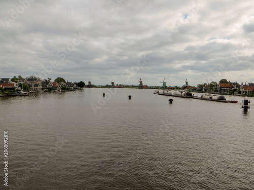 Panoramic view of windmills in Zaanse Schans, traditional village in the Netherlands.