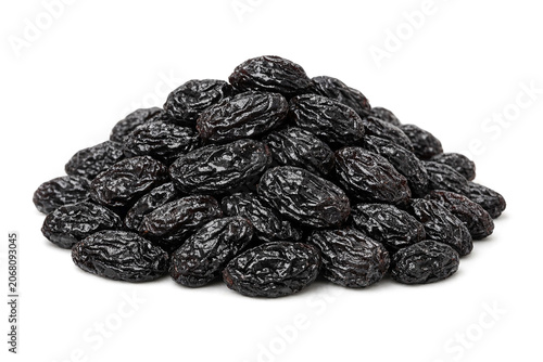 Close-up photograph of raisins against a white backdrop.