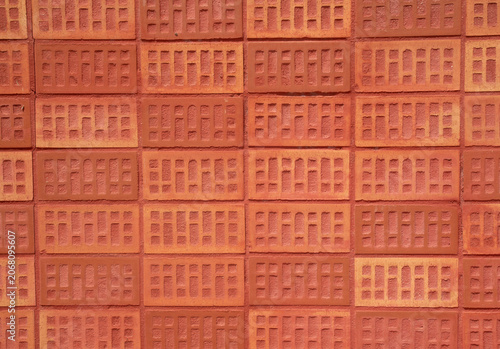 Red brick wall texture background closeup