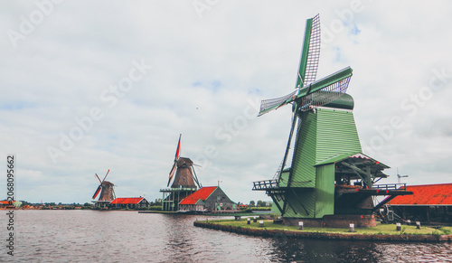 De Gekroonde Poelenburg Windmill (The Crowned Poelenburg). Traditional Dutch old wooden windmill in Zaanse Schans - museum village in Zaandam. The Netherlands.