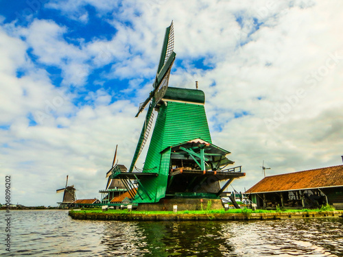 De Gekroonde Poelenburg Windmill (The Crowned Poelenburg). Traditional Dutch old wooden windmill in Zaanse Schans - museum village in Zaandam. The Netherlands.