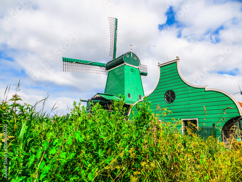 De Gekroonde Poelenburg Windmill (The Crowned Poelenburg). Traditional Dutch old wooden windmill in Zaanse Schans - museum village in Zaandam. The Netherlands.