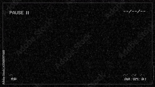 Retro analog vhs pause screen with grainy static noise and old timecode