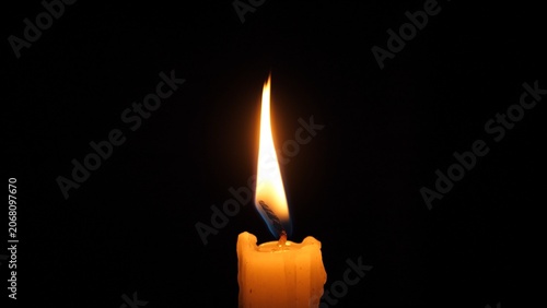 Принти на полотні Single Candle Flame Flickering In Darkness, Soft Wax Drips Forming Textured Silh