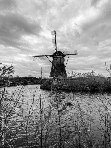 The windmills of Kinderdijk, in the province of South Holland, Netherlands. Nineteen beautiful windmills, built around 1740, stand here as part of a larger water management system to prevent floods.