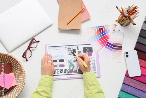 Interior designer working o...