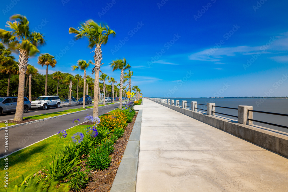 Fototapeta premium Murray Boulevard Charleston North Carolina view of garden and walkway by the Ashley River circa 2026