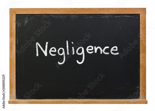 Принти на полотні Negligence written in white chalk on a black chalkboard isolated on white