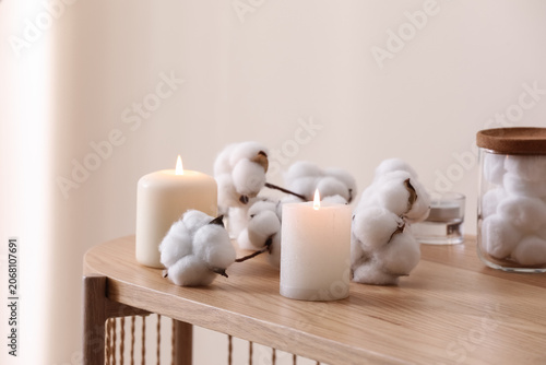Cozy home decor with lit ca...