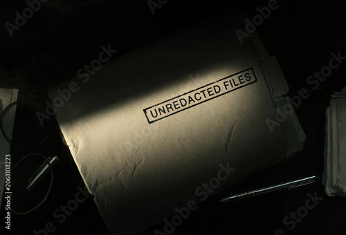 Unredacted Files Folder On Mystery Desk
