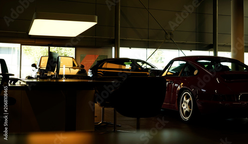 Silhouettes of cars in the showroom of the car dealership.