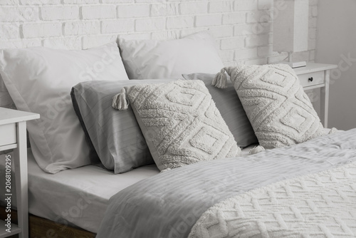 Big bed with soft pillows i...