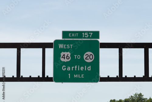 exit 157 sign on the Garden State Parkway in New Jersey for US-46 to NJ-20 and Garfield