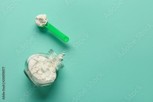 Jar of powdered milk with m...
