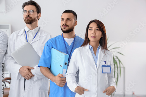 Female Asian doctor with he...