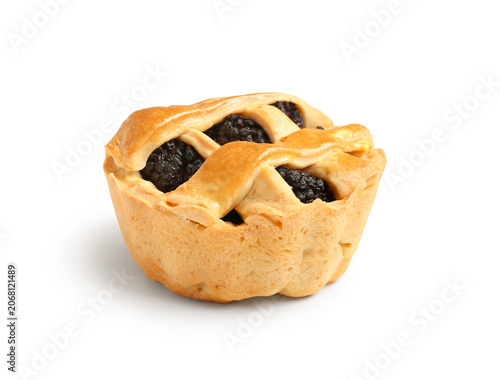 Tasty blackberry pie on whi...