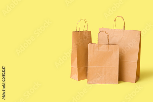 Paper shopping bags on yell...