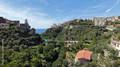 Canvastavla Scenic view of Vico Equense hillside ravine with lush green vegetation, historic