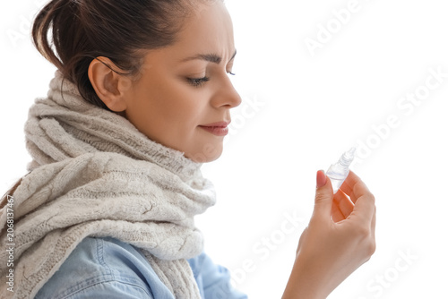 Ill young woman with nasal ...