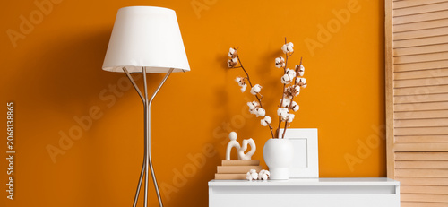 Vase with cotton flowers an...