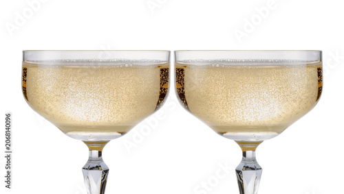 Quadro su tela Isolated two elegant champagne coupes with sparkling golden wine, festive celebr