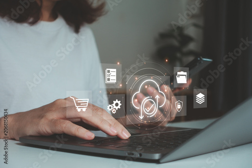 Photography Businesswoman using laptop migrate file system, network and internet, storage and data transfer with cloud technology