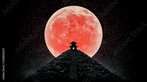 Silhouette of Asian pagoda on hilltop against massive red moon
