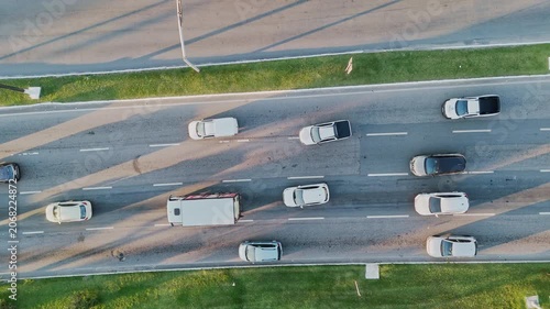 Top Down Aerial View of City Traffic Jam with Multiple Vehicles on Multi-Lane Highway Avenue Street Road