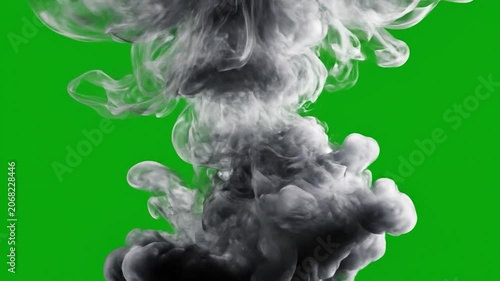 White smoke plume rising against a solid green screen background