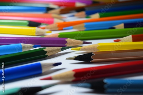 Colored pencils on white background