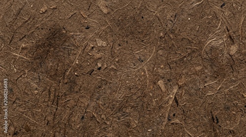 Dark brown organic fiber paper background.