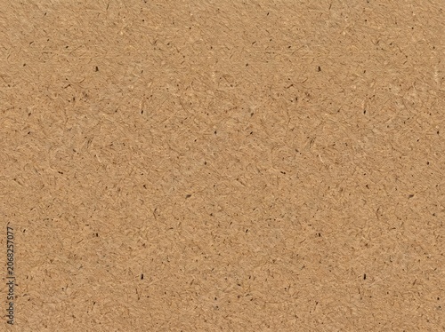 Brown fiberboard particle board texture background.