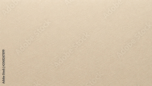 Beige leather texture close up photo with subtle grain and neutral tone