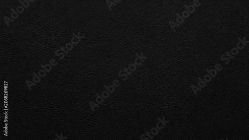 Foto Black leather texture close up studio shot with subtle grain