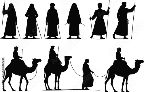 Fotografie Black silhouettes of ancient desert travelers, nomads, and traders riding camels