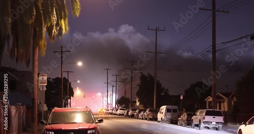 Los Angeles, California, USA - June 18, 2026: Toxic smoke billows out from a warehouse fire in the East LA Boyle Heights neighborhood. 