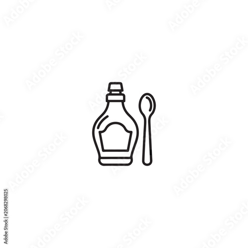 Sauce bottle with spoon for condiments or sauces.