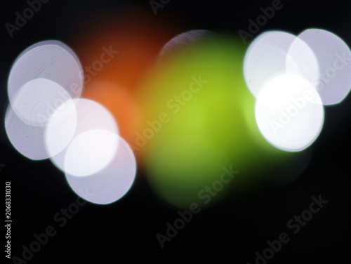 Tableau sur toile Un fondo abstracto de luces de navidad de diferentes colores en la oscuridad
